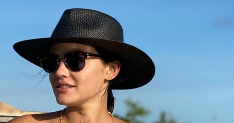 Lucy Hale Stuns Poolside in a Strapless Black Bikini