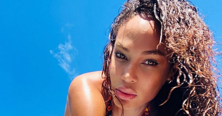 Joan Smalls Shows Off Her Toned Physique in a Plunging One-Piece