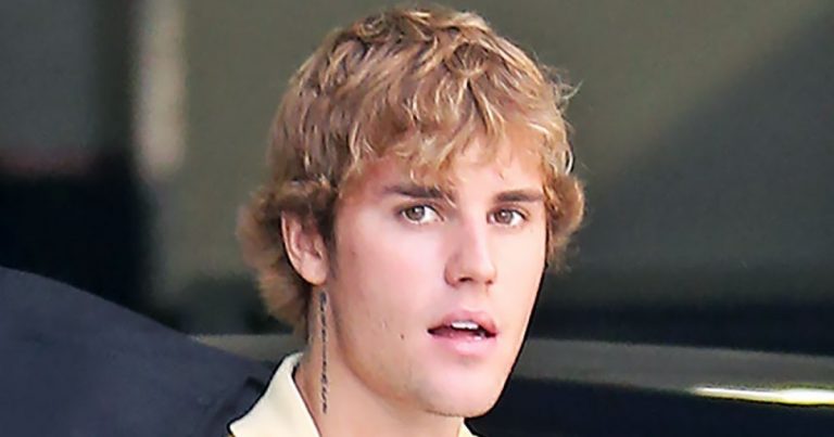 Justin Bieber Jokes He's Growing His Hair Out to Look Like Brad Pitt