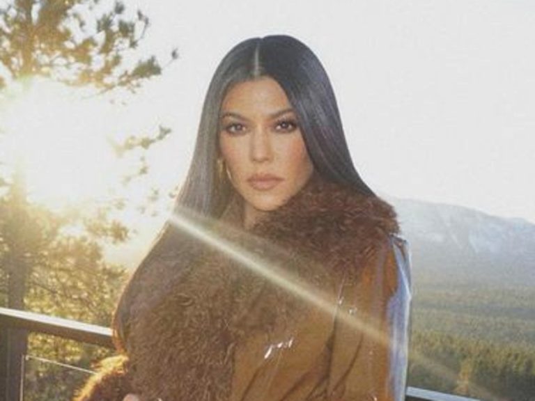 Kourtney Kardashian Glistens In Glossy Leather Coat