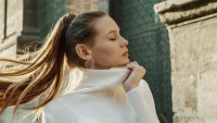 Woman-Wearing-Earrings-Stock-Photo