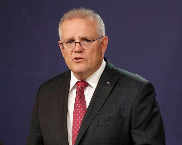 Australian prime minister backs down on jail threats as India travel ban backlash intensifies