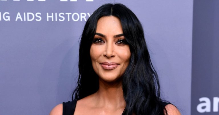 Peek-a-boo! Kim Kardashian Flaunts Her Curves in a See-Through Cutout Dress