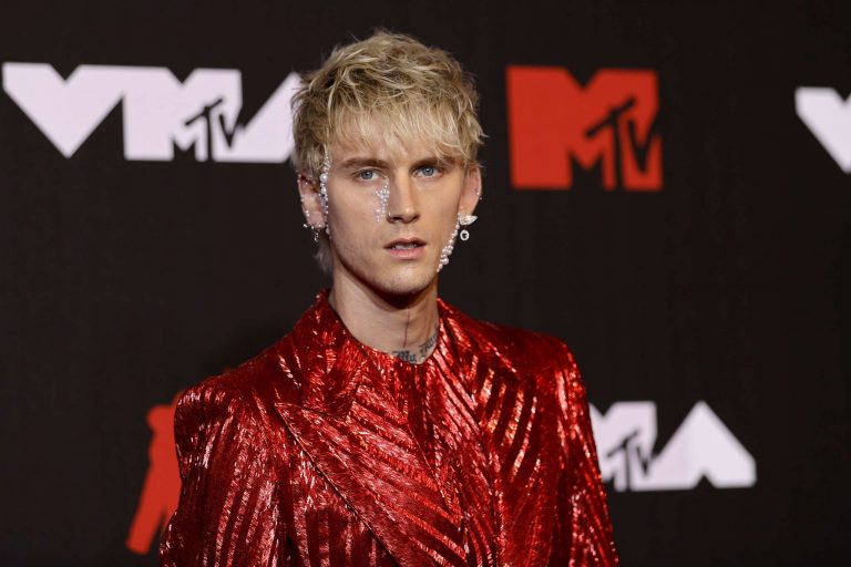 MGK Explains Why He Broke A Champagne Flute On His Face