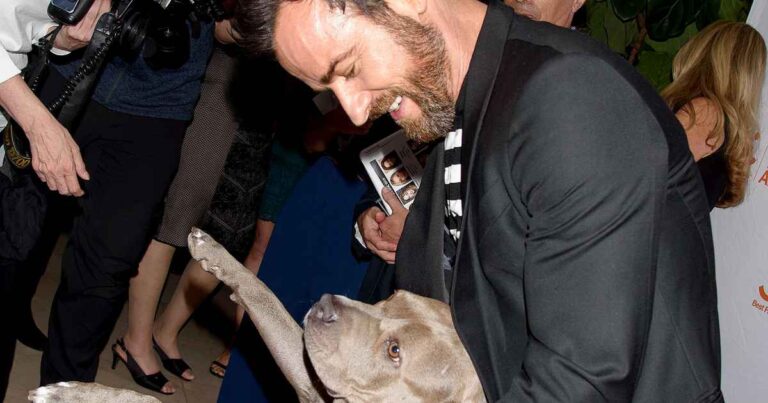 See Justin Theroux’s Sweetest Moments With His Precious Pup Kuma